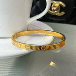 Bracelete Cart Liso em Aço Dourado 2